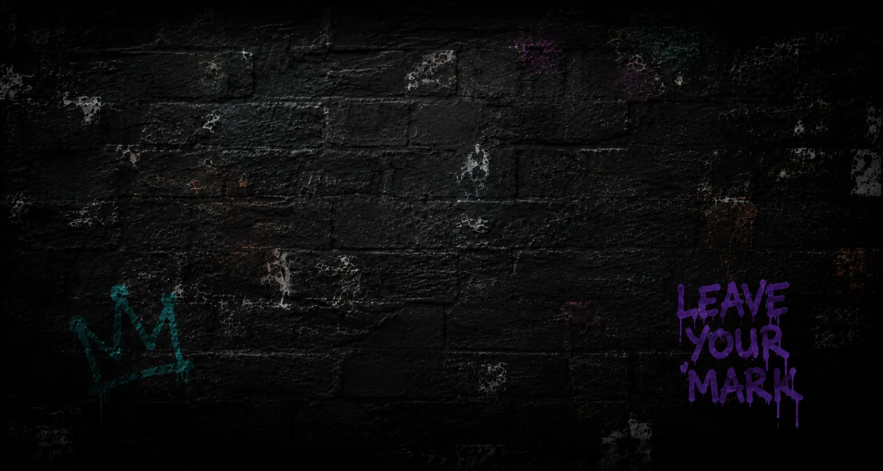 A dark textured wall with subtle colorful markings